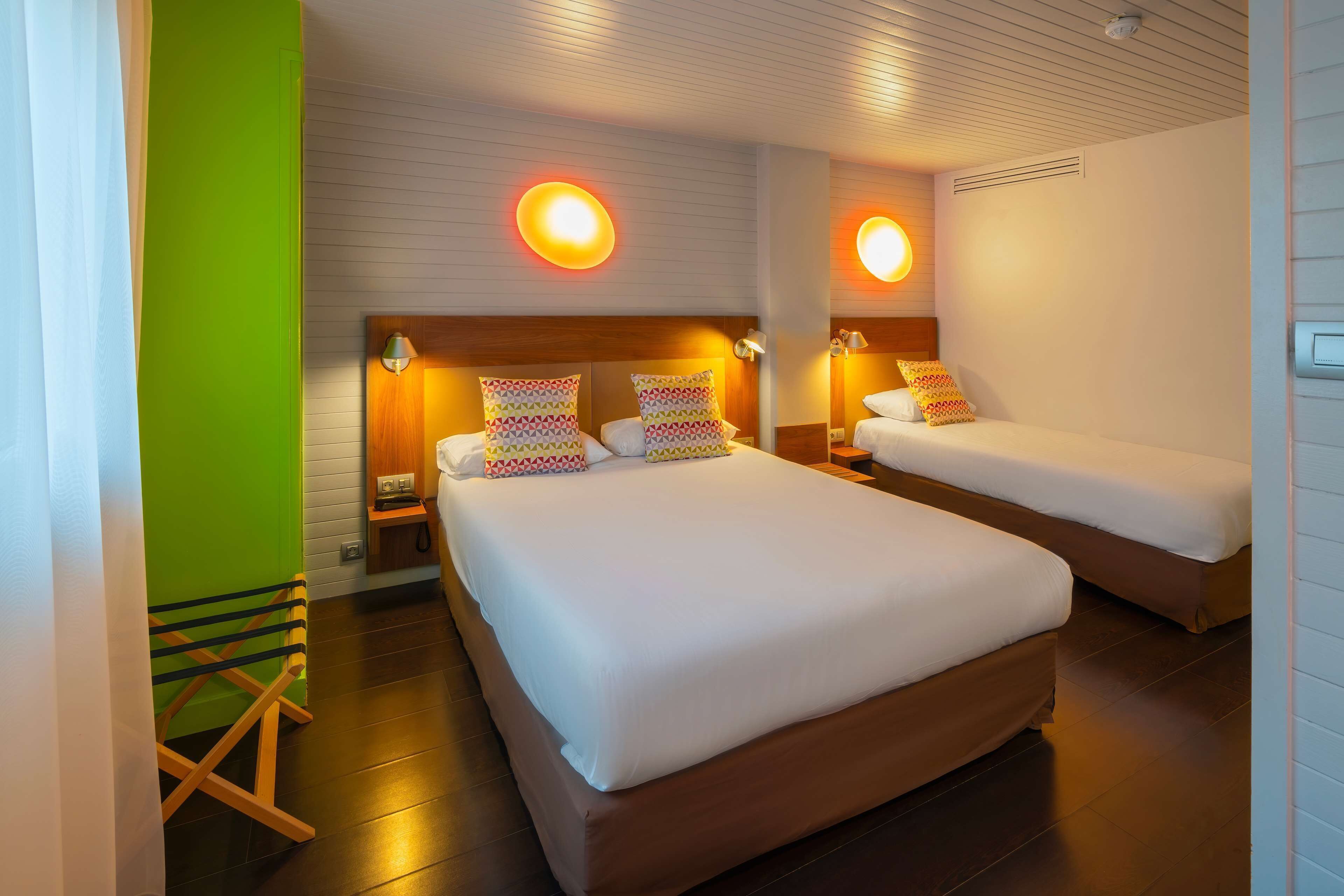 room, multiple beds | view from room