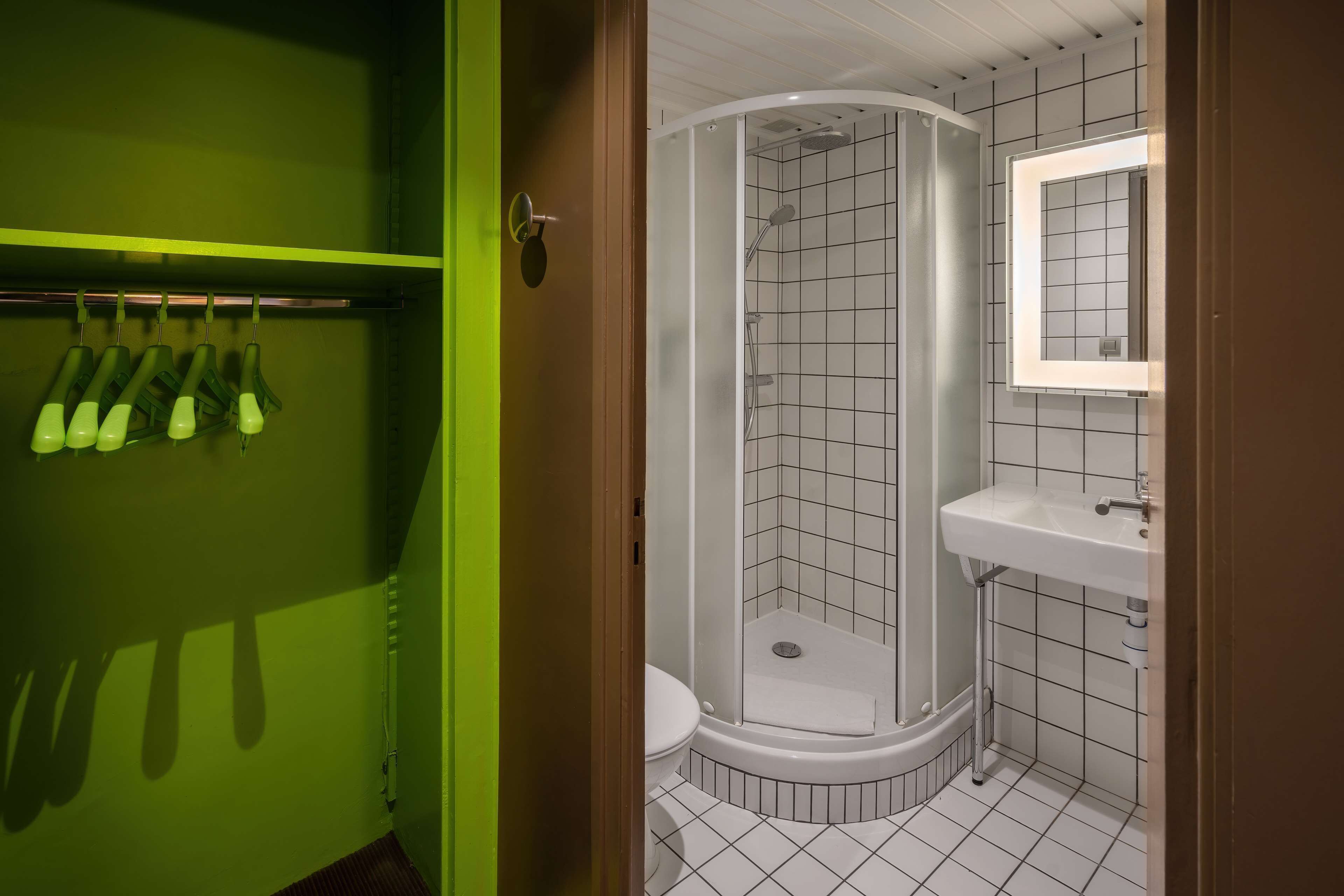 room, multiple beds | bathroom | eco-friendly toiletries, hair dryer, towels