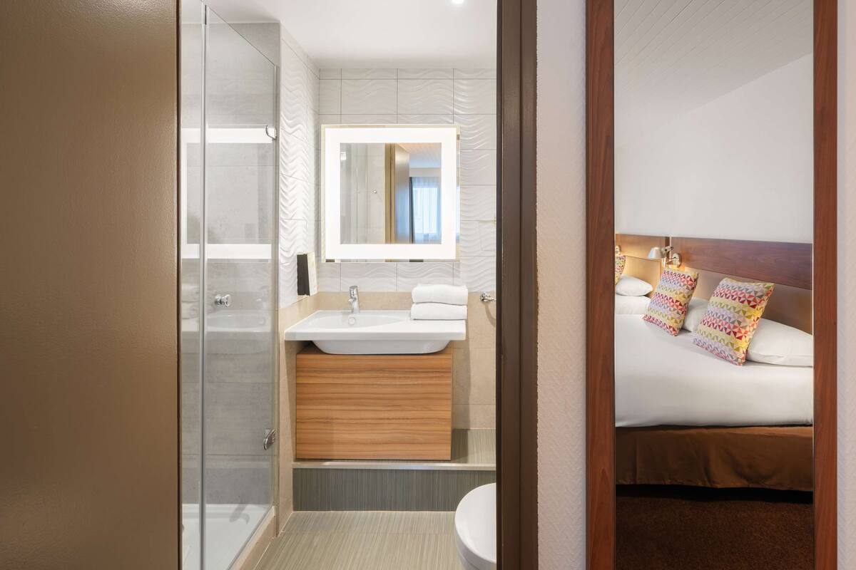 room, multiple beds | view from room