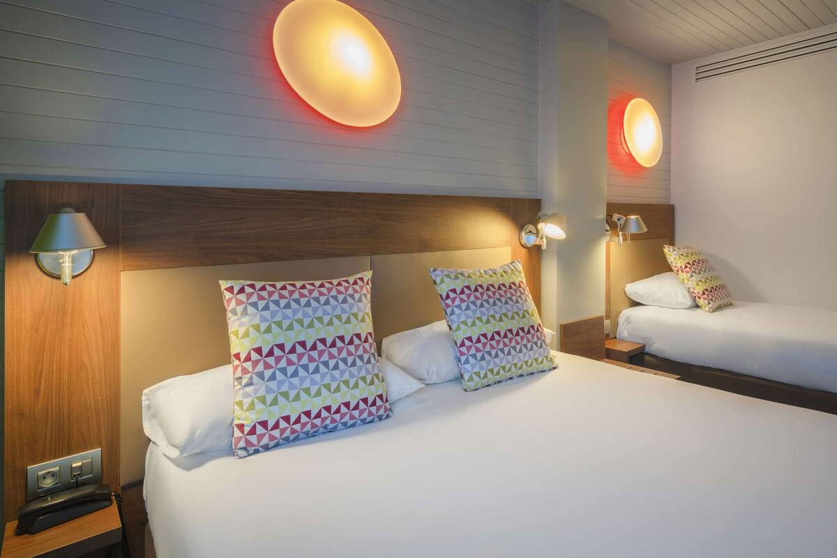 room, multiple beds | desk, laptop workspace, blackout curtains, soundproofing