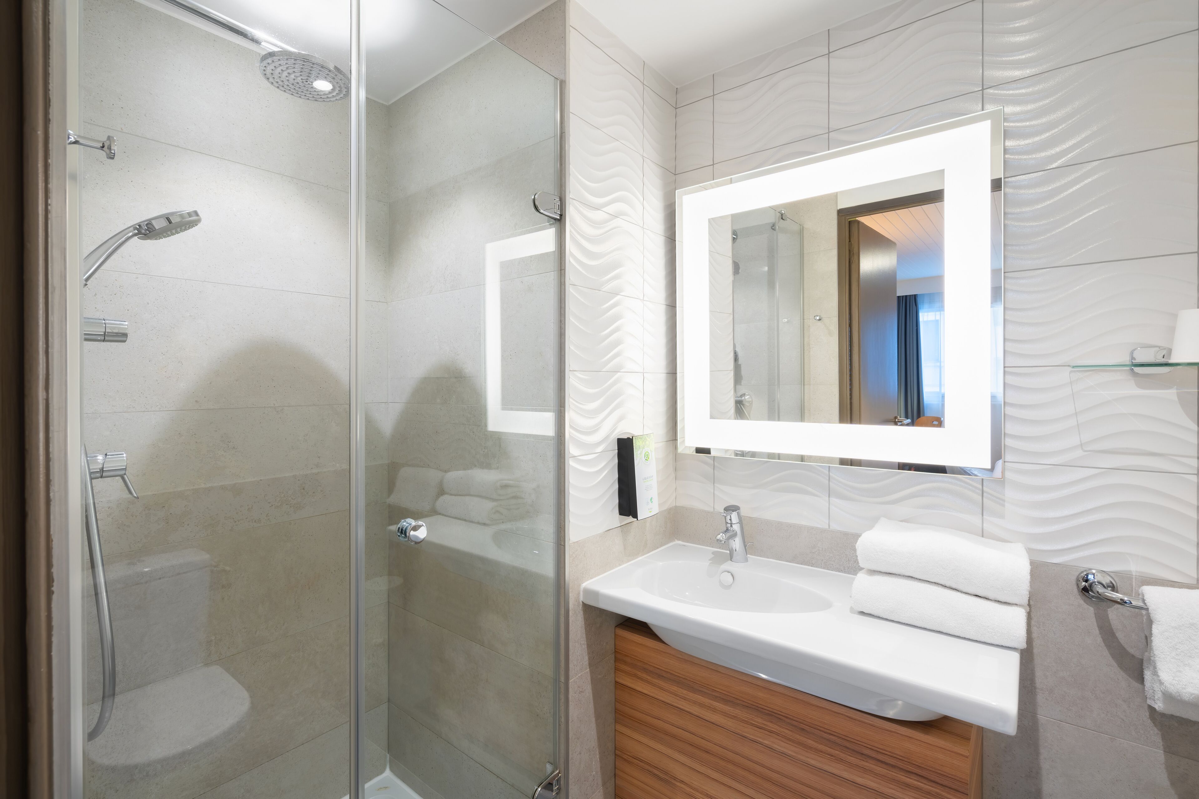 eco-friendly toiletries, hair dryer, towels