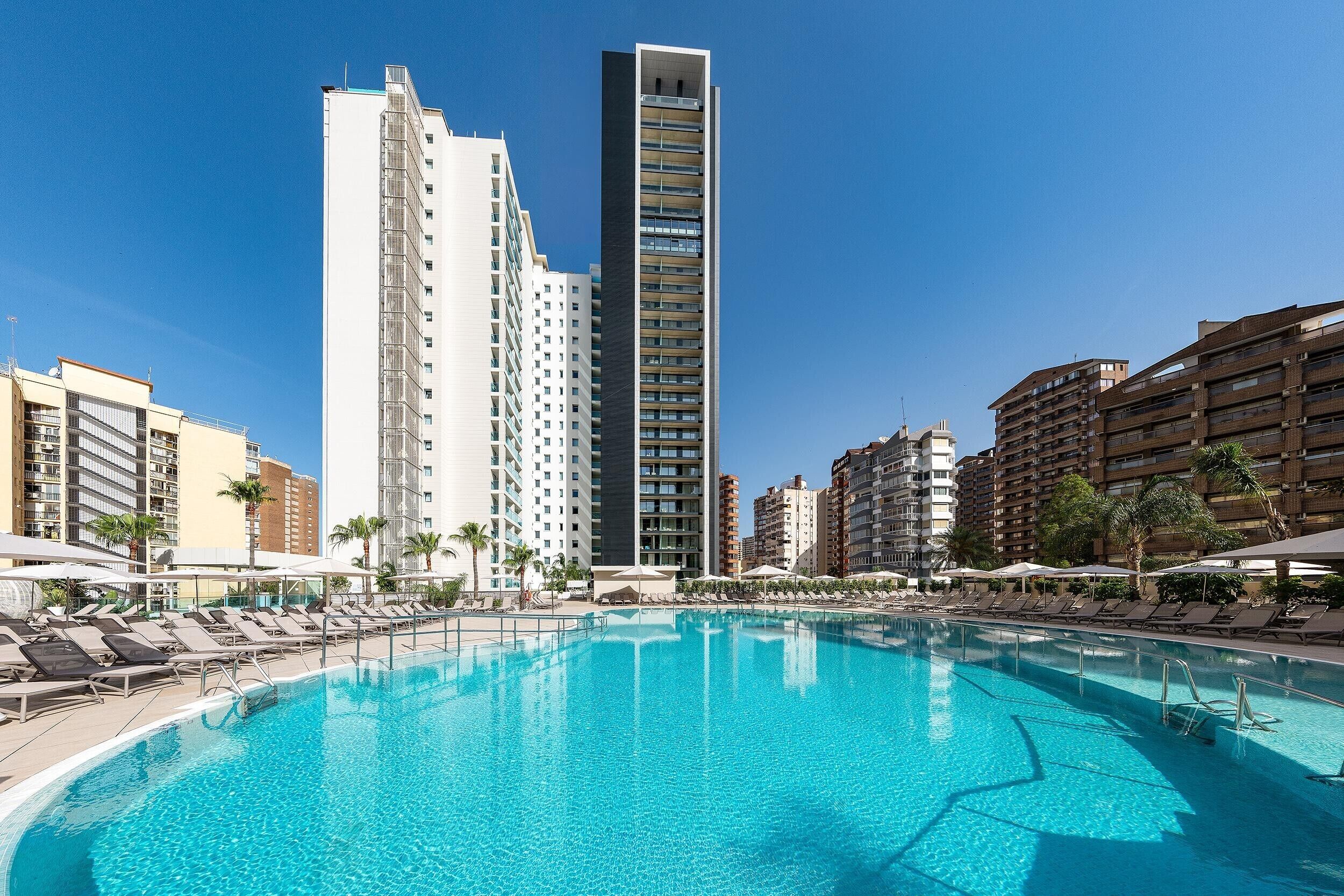 Outdoor pool, open 9:00 AM to 8:00 PM, pool umbrellas, sun loungers