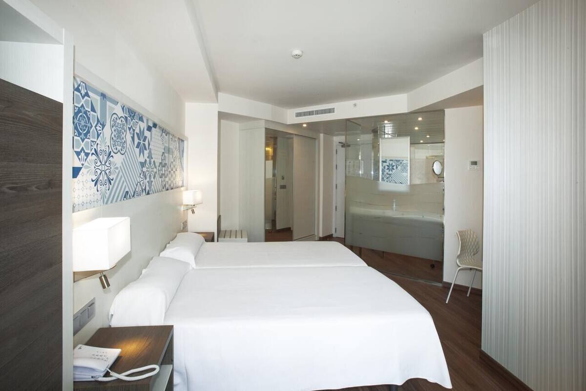 Couette en duvet, minibar, rideaux d’obscurcissement
