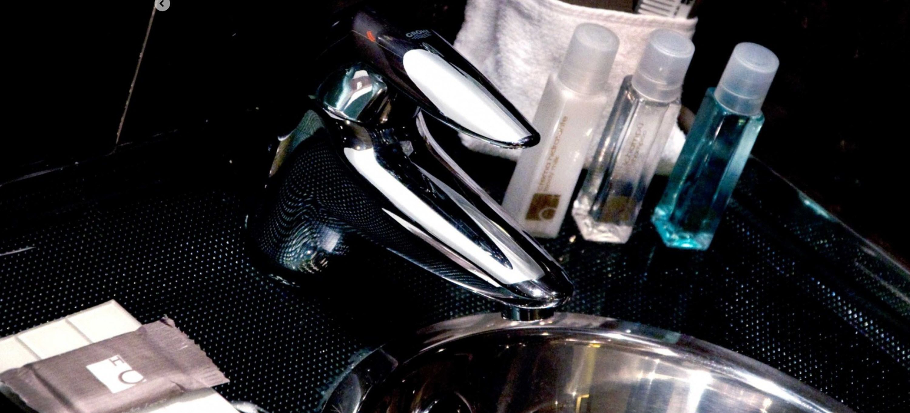 shower, rainfall showerhead, hair dryer, towels