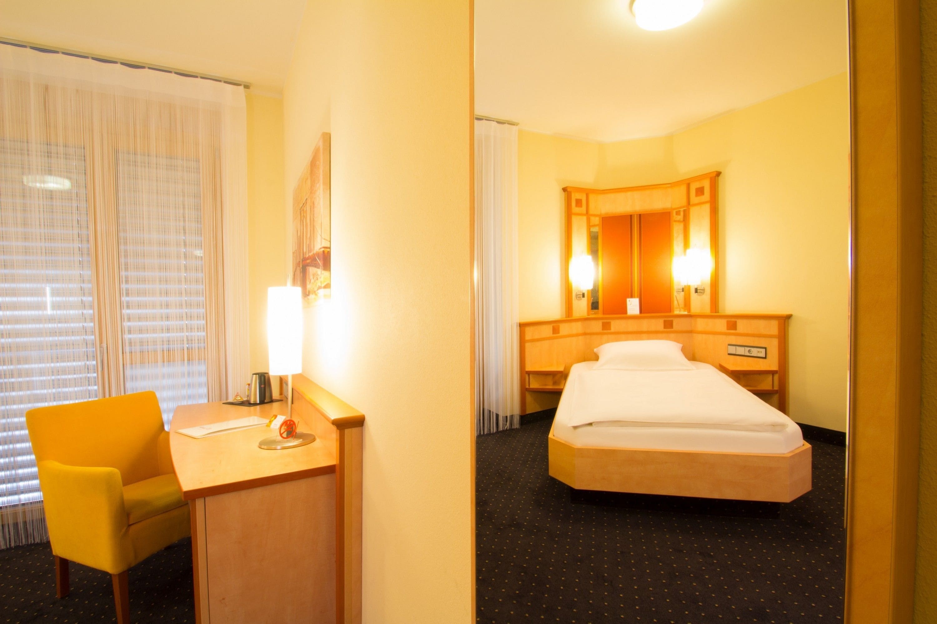 comfort single room | premium bedding, minibar, in-room safe, desk