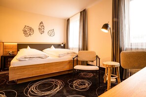 Ropa de cama de alta calidad y minibar 