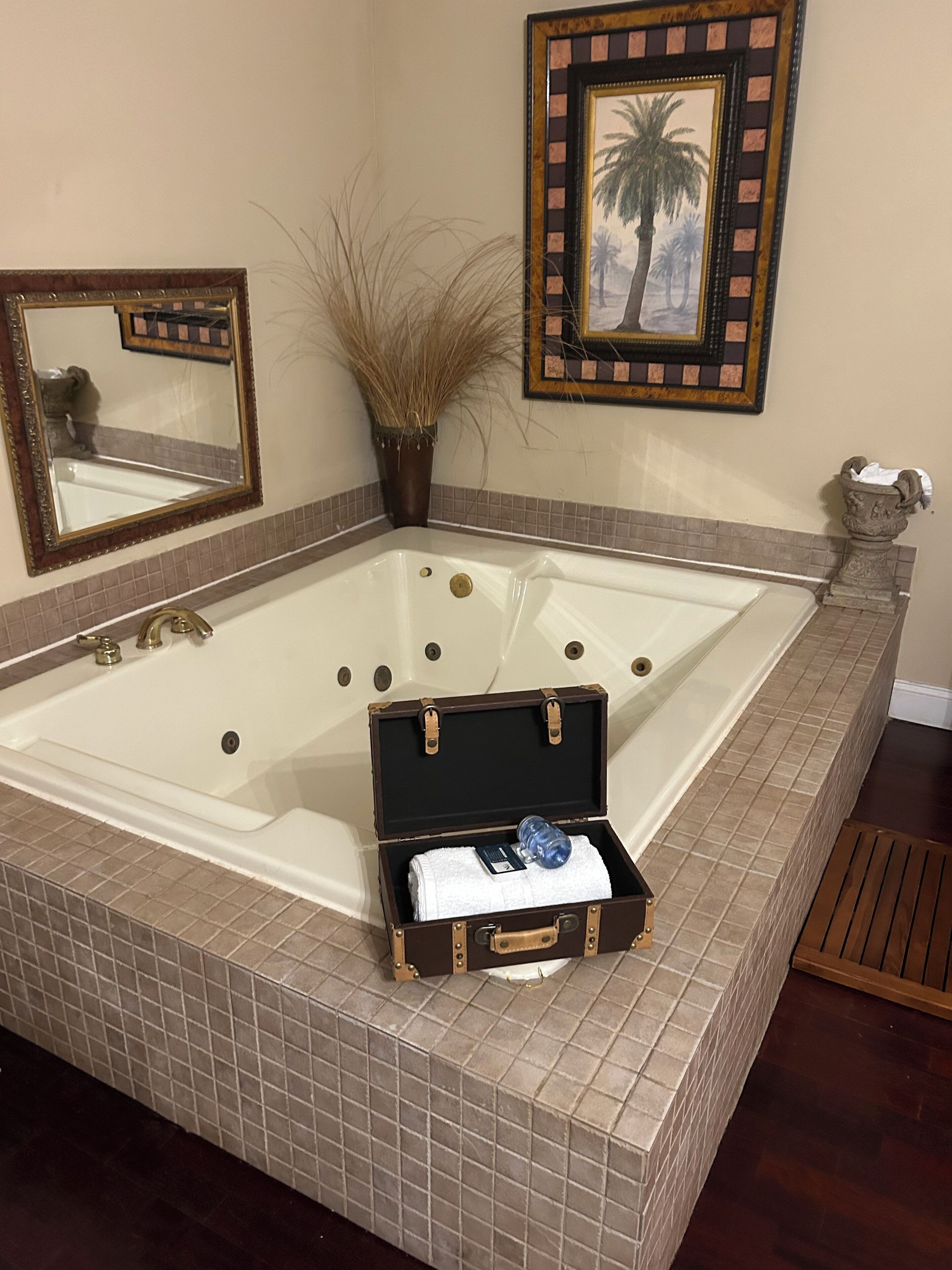 luxury suite, 1 bedroom, jetted tub | bathroom | combined shower/bathtub, designer toiletries, hair dryer, towels