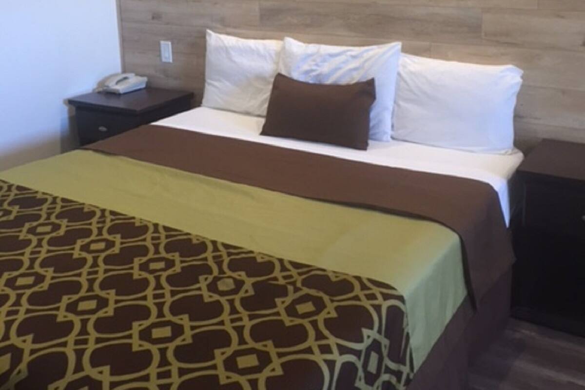 Blackout drapes, iron/ironing board, free WiFi, bed sheets