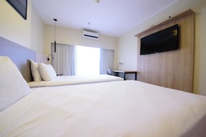 Deluxe Room, 2 Twin Beds, Non Smoking | Minibar, in-room safe, desk, blackout drapes