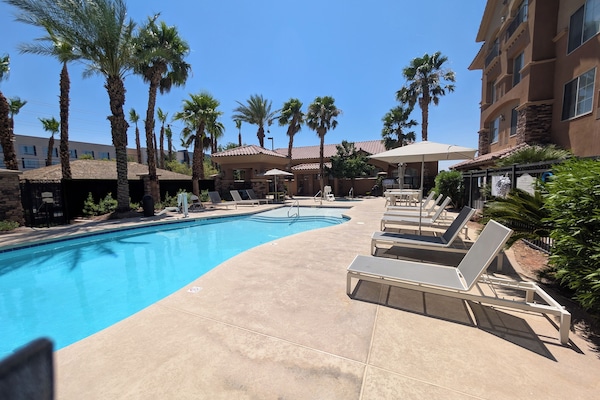 Outdoor pool, pool umbrellas, pool loungers