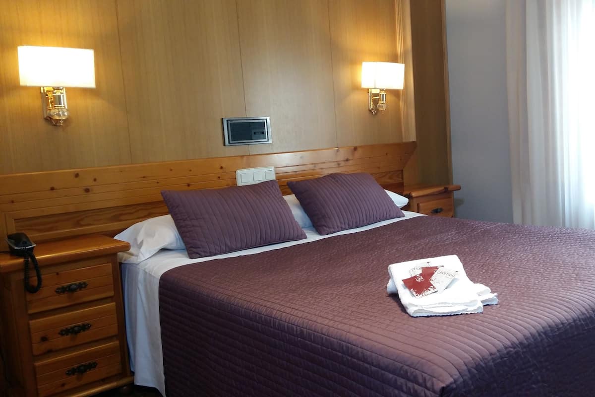Desk, free WiFi, bed sheets
