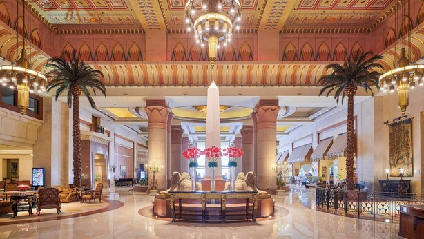 A spacious lobby with a central fountain, palm trees, and a chandelier. - InterContinental Cairo Citystars by IHG (Cairo)
