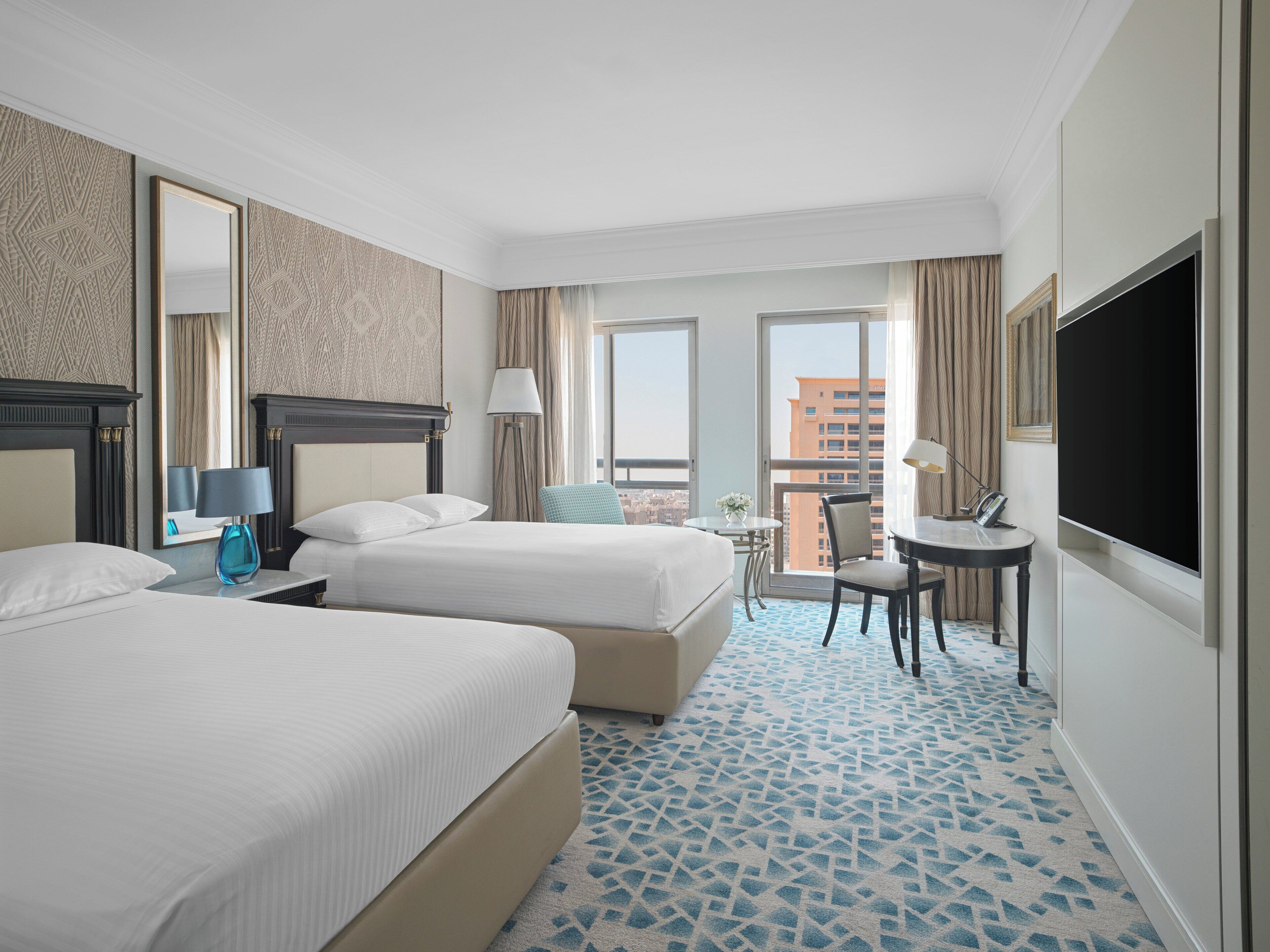 Down comforters, minibar, in-room safe, desk