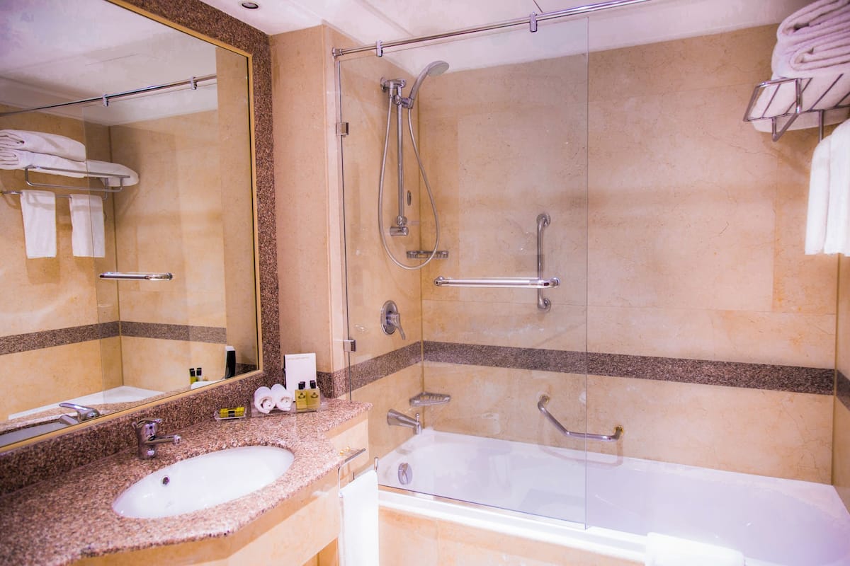 Combined shower/bathtub, free toiletries, hair dryer, bathrobes
