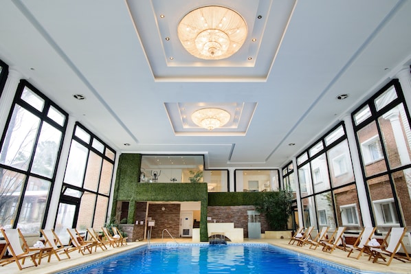 Indoor pool, open 10:00 AM to 10:00 PM, sun loungers