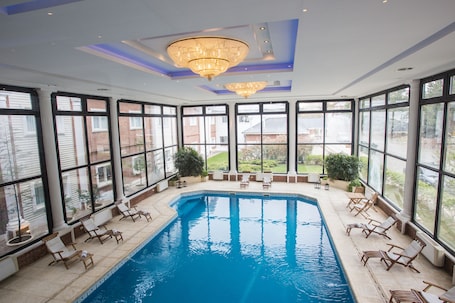 Indoor pool, open 10:00 AM to 10:00 PM, sun loungers