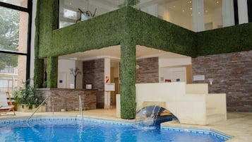 Indoor pool, open 10:00 AM to 10:00 PM, sun loungers