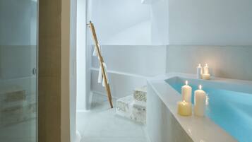 Cosmopolitan Suite - Indoor Jetted Tub | Bathroom amenities | Shower, designer toiletries, hair dryer, bathrobes