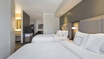 Ropa de cama hipoalergénica, camas con pillow-top y escritorio