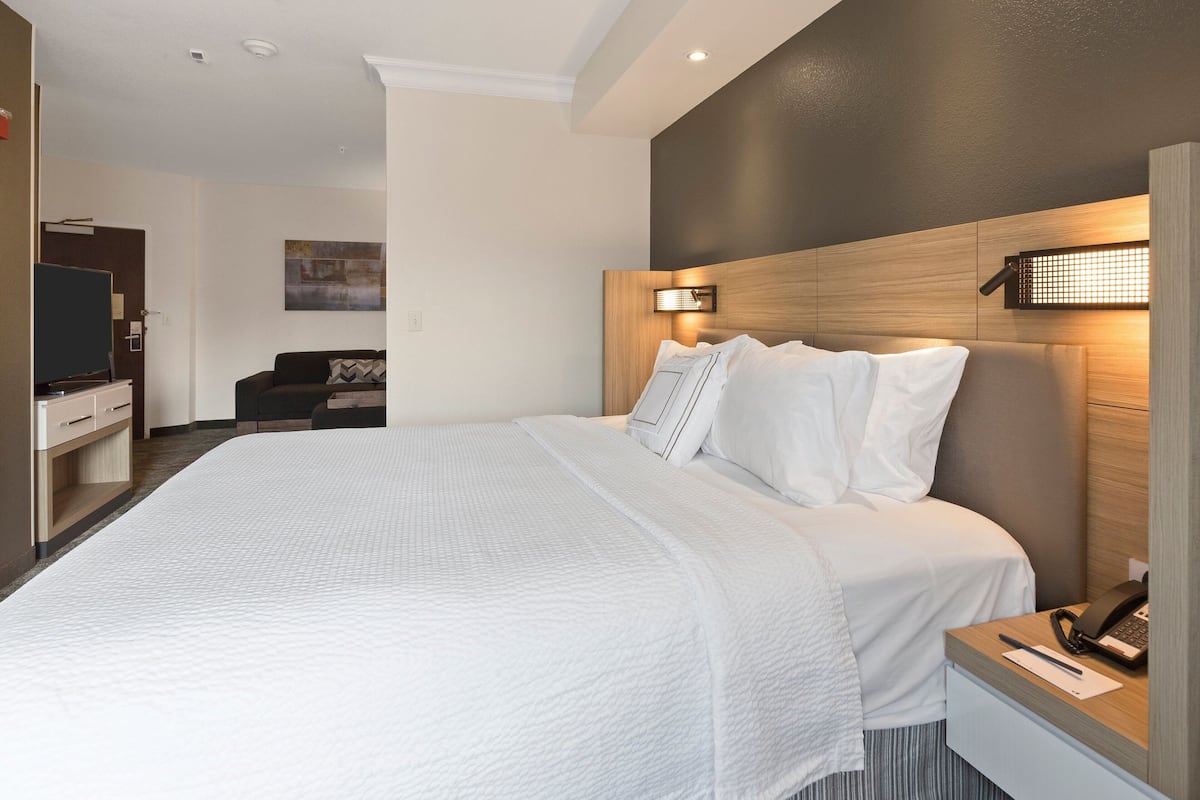 Hypo-allergenic bedding, pillow-top beds, desk, laptop workspace