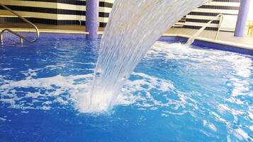 Indoor pool, outdoor pool, pool umbrellas, sun loungers