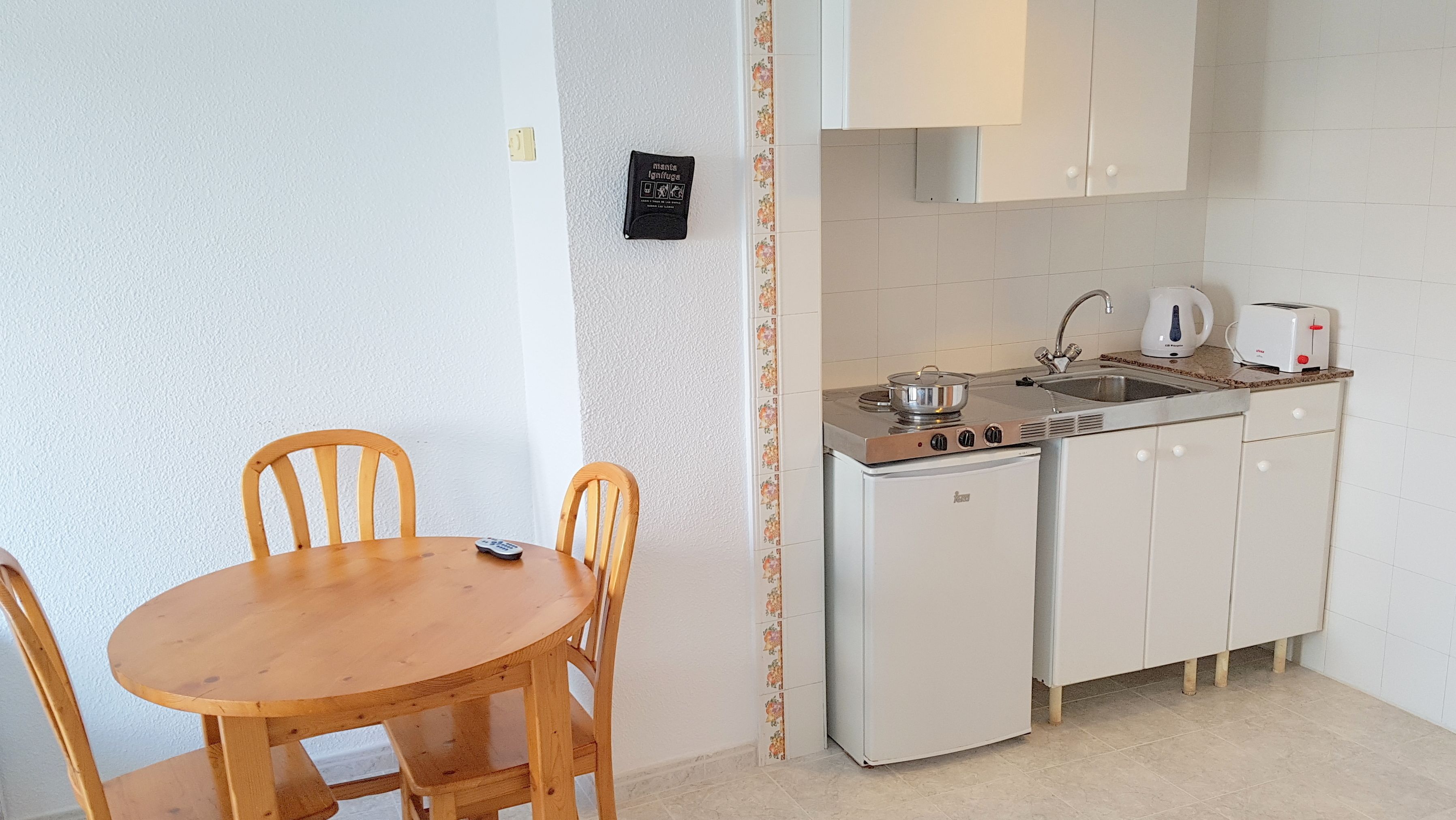 apartment, 1 bedroom, balcony | private kitchen | full-sized fridge, stovetop, electric kettle, cookware/dishes/utensils