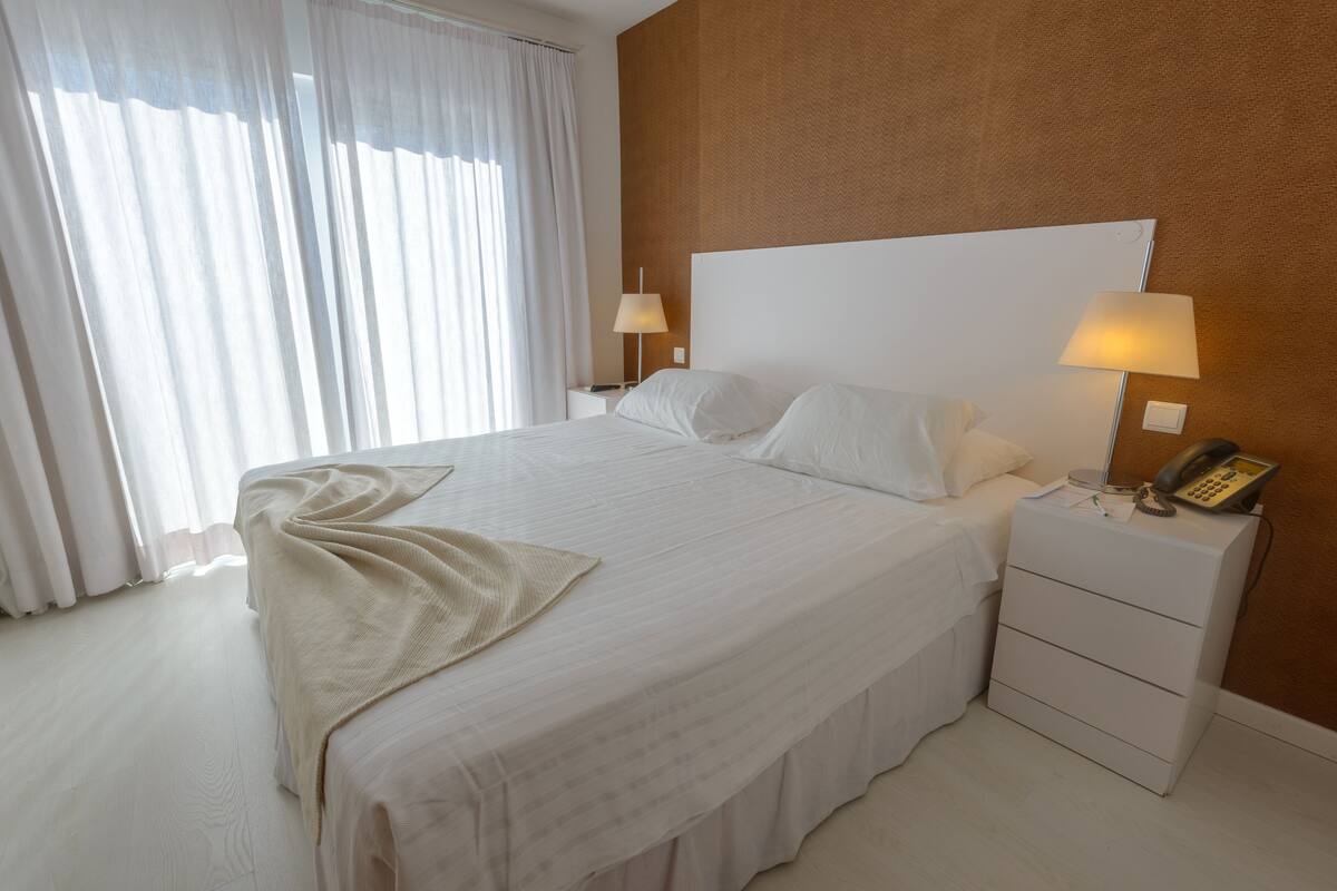 In-room safe, desk, blackout curtains, soundproofing