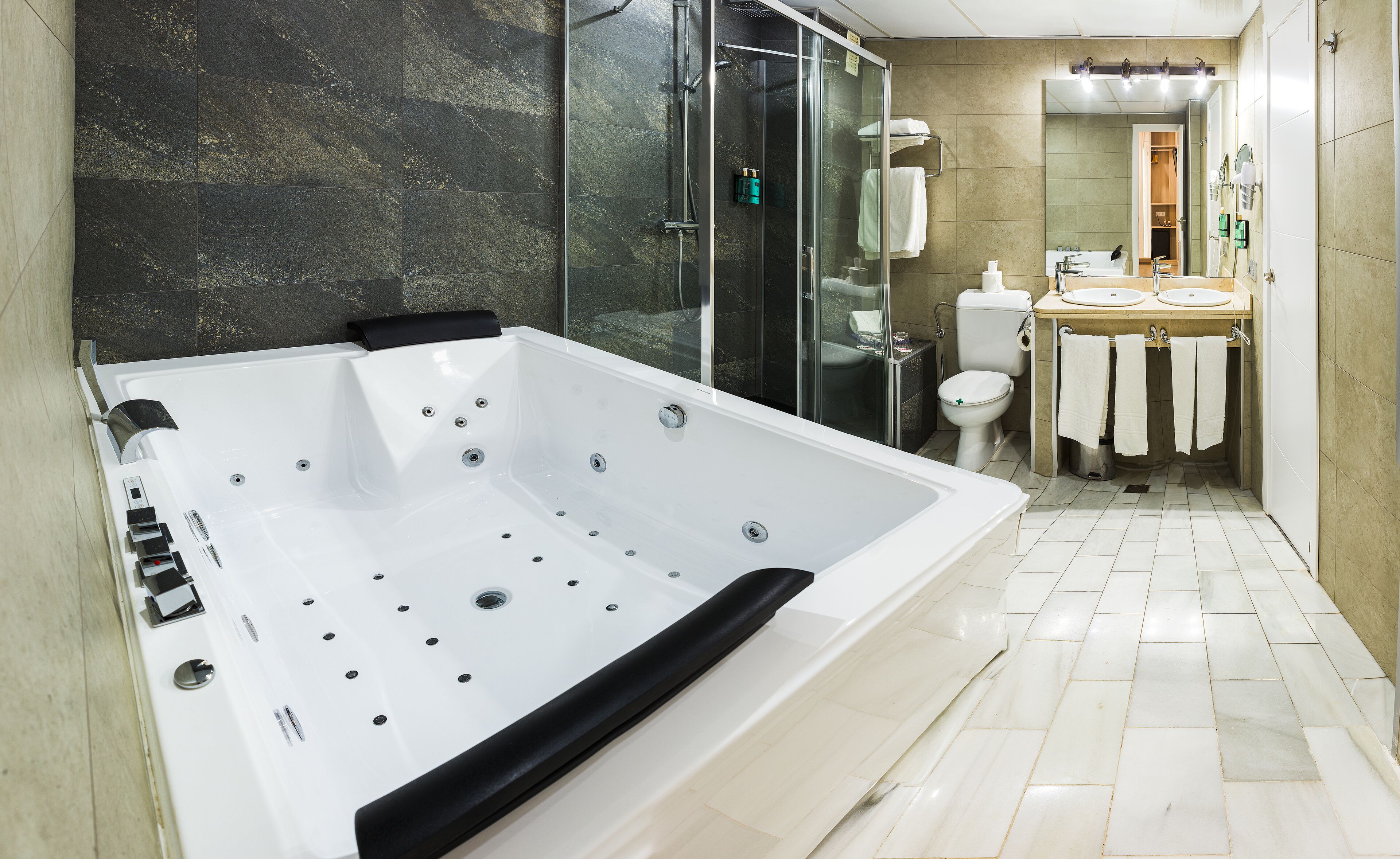 junior suite, 1 queen bed with sofa bed | bathroom | designer toiletries, hair dryer, bidet, towels