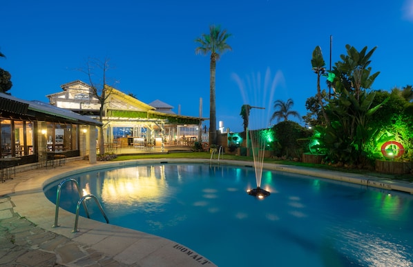 Outdoor pool, pool umbrellas, pool loungers