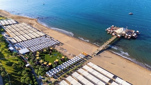 Private beach, free beach shuttle, sun-loungers, beach umbrellas