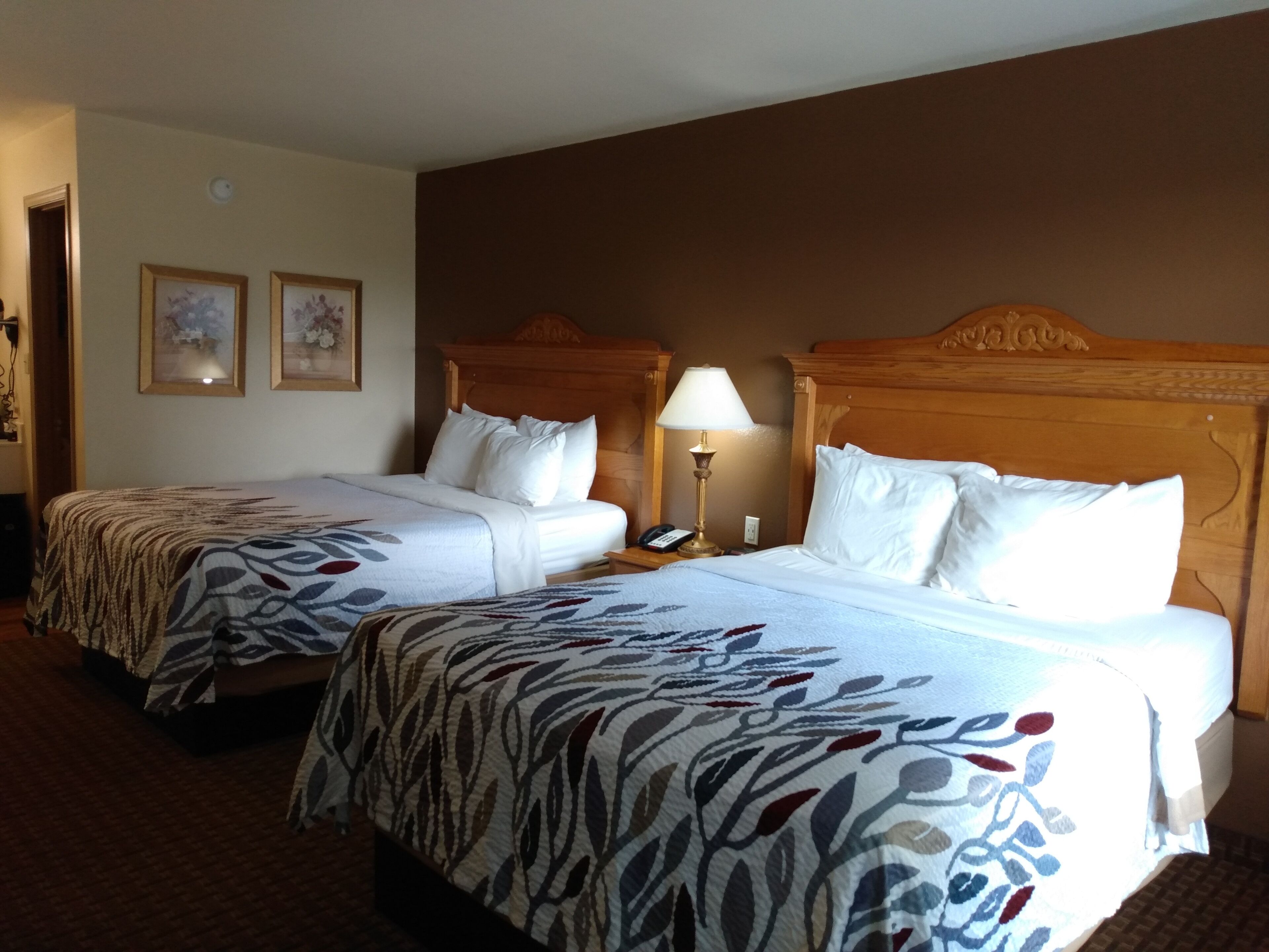 standard room, 2 queen beds | desk, blackout curtains, iron/ironing board, free cots/infant beds