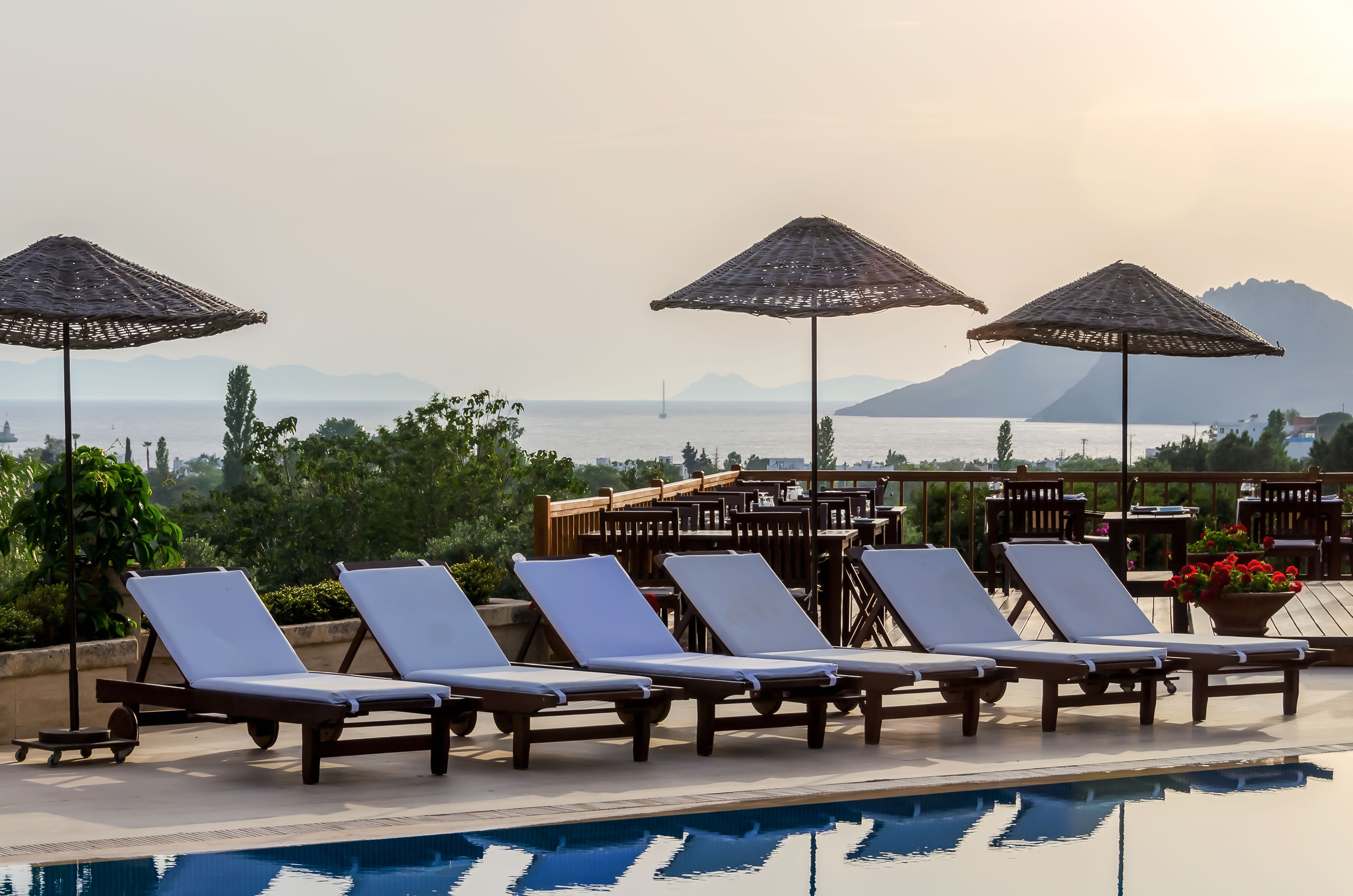 Outdoor pool, pool umbrellas, sun loungers