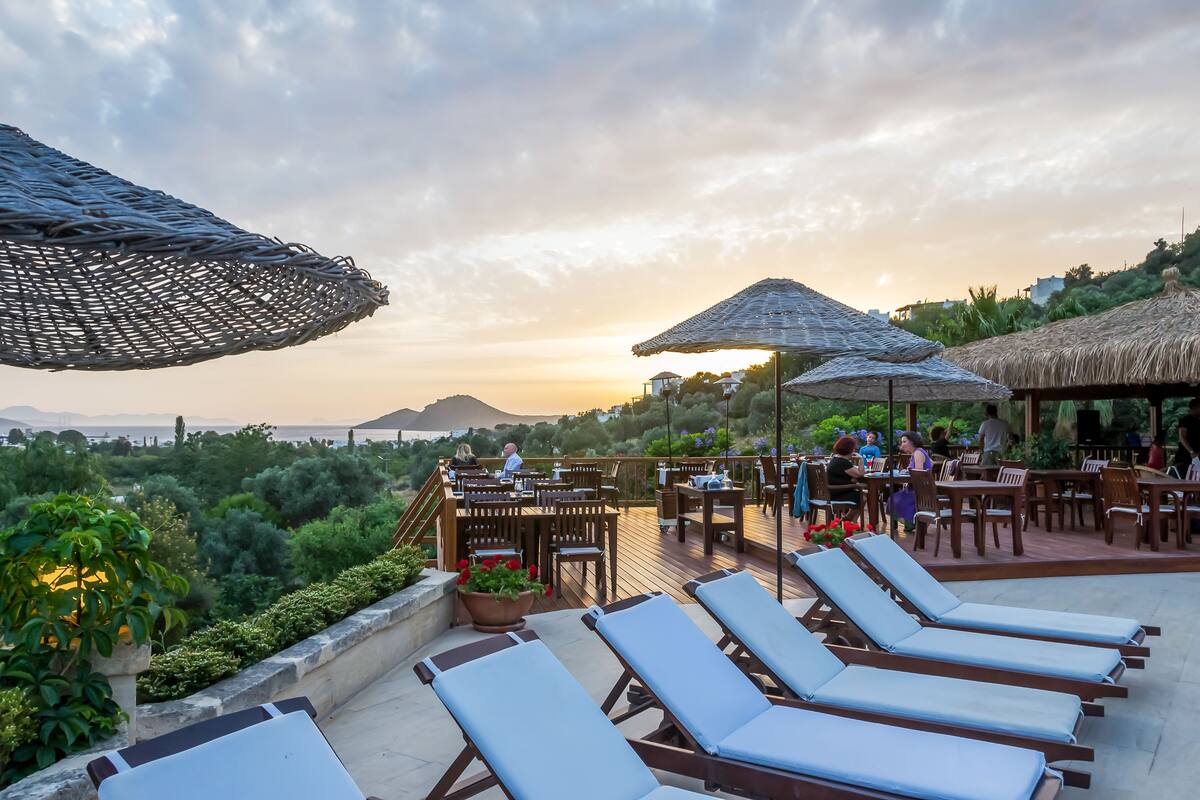 outdoor pool, pool umbrellas, pool loungers