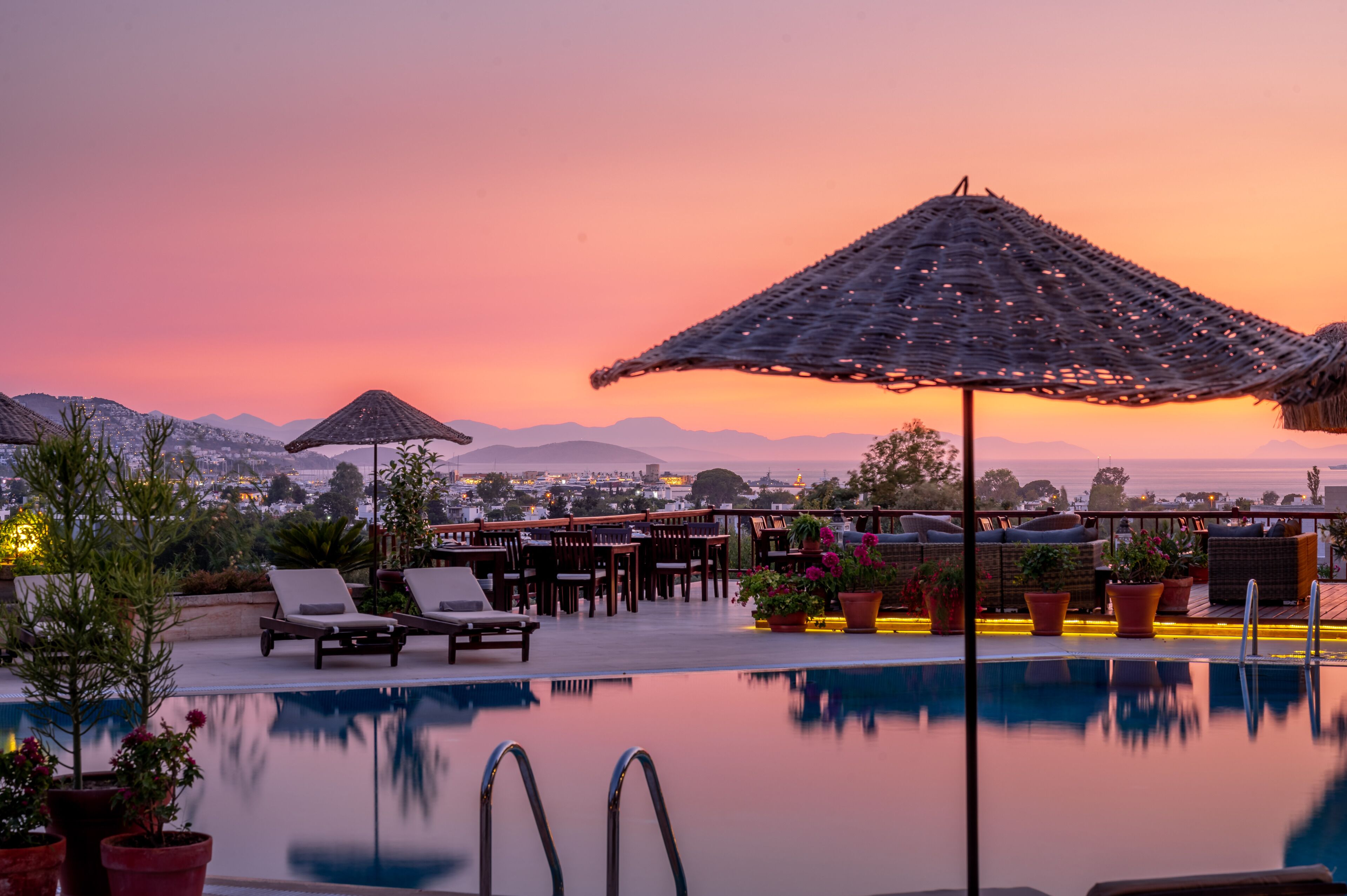 outdoor pool, pool umbrellas, pool loungers