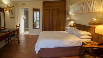 Pool Side | In-room safe, individually decorated, desk, laptop workspace