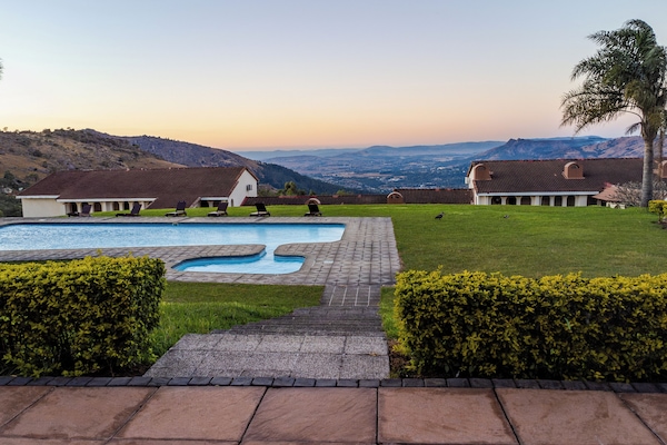 Outdoor pool, pool umbrellas, sun loungers