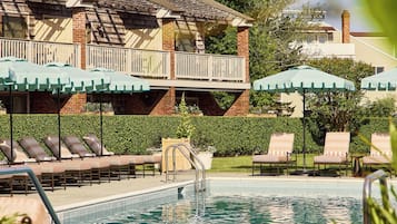 Seasonal outdoor pool, pool cabanas (surcharge), pool umbrellas