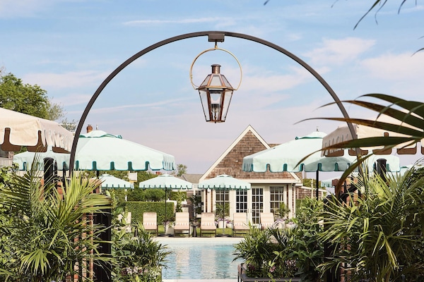 Seasonal outdoor pool, cabanas (surcharge), pool umbrellas