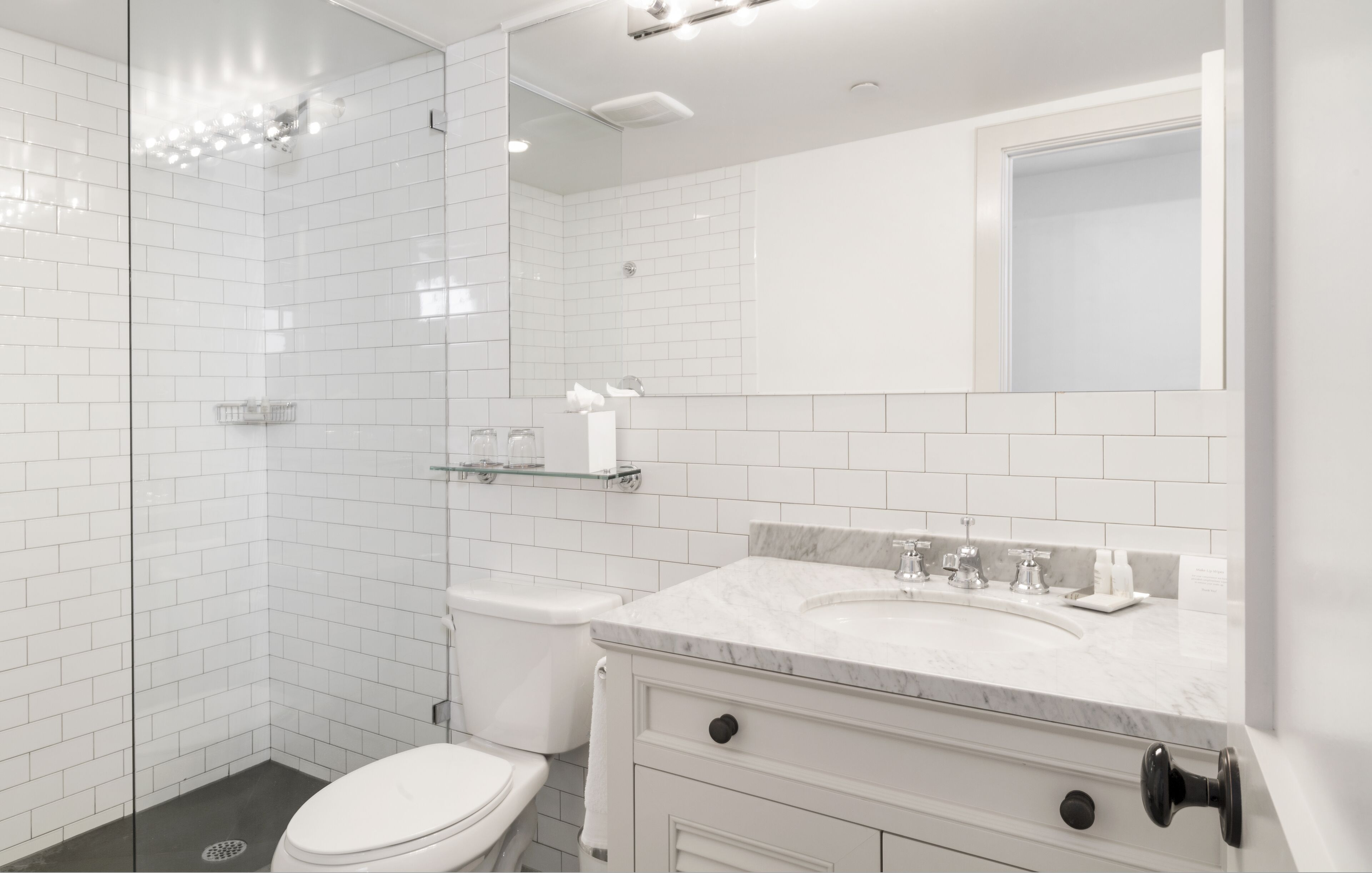 designer toiletries, hair dryer, bathrobes, towels