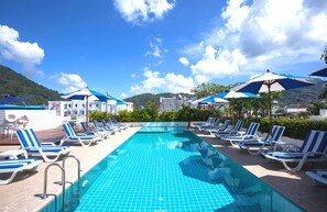 3 outdoor pools, open 7:00 AM to 9:00 PM, pool umbrellas, pool loungers