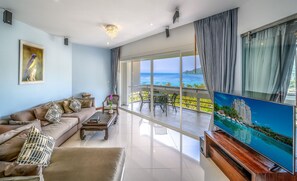Royal Suite, 2 Bedrooms, Sea View | Living area | 32-inch Smart TV with satellite channels - Andaman Beach Suites Hotel (Patong)