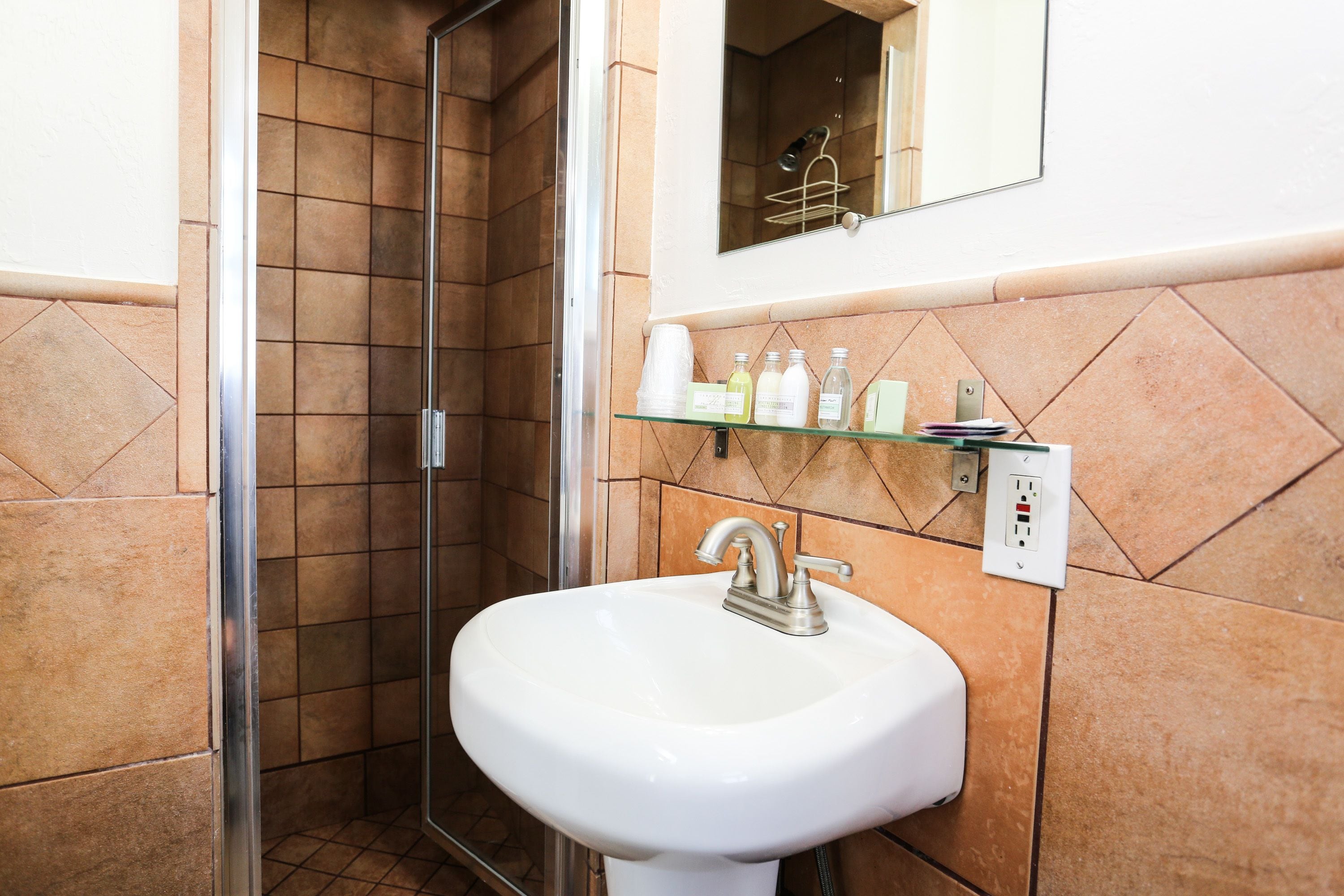 panoramic room, 1 queen bed, non smoking, ocean view | bathroom | shower, towels