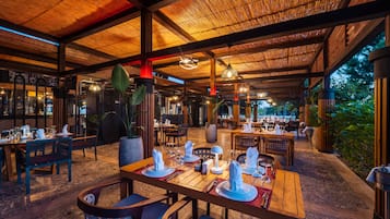 Breakfast, lunch, dinner served; international cuisine, pool views
