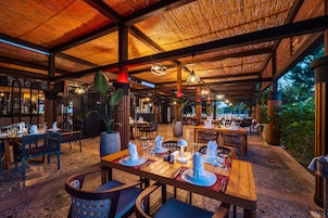 Breakfast, lunch, dinner served; international cuisine, pool views