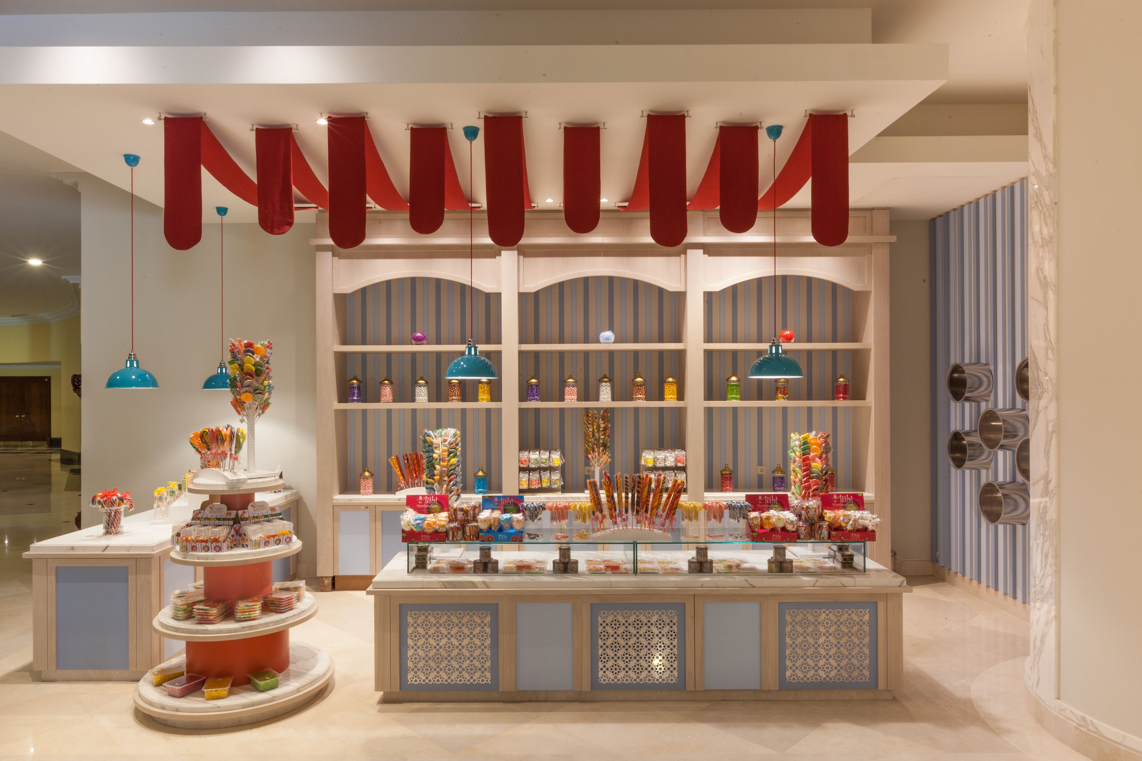 A dessert display with multiple tiers and a variety of sweets.