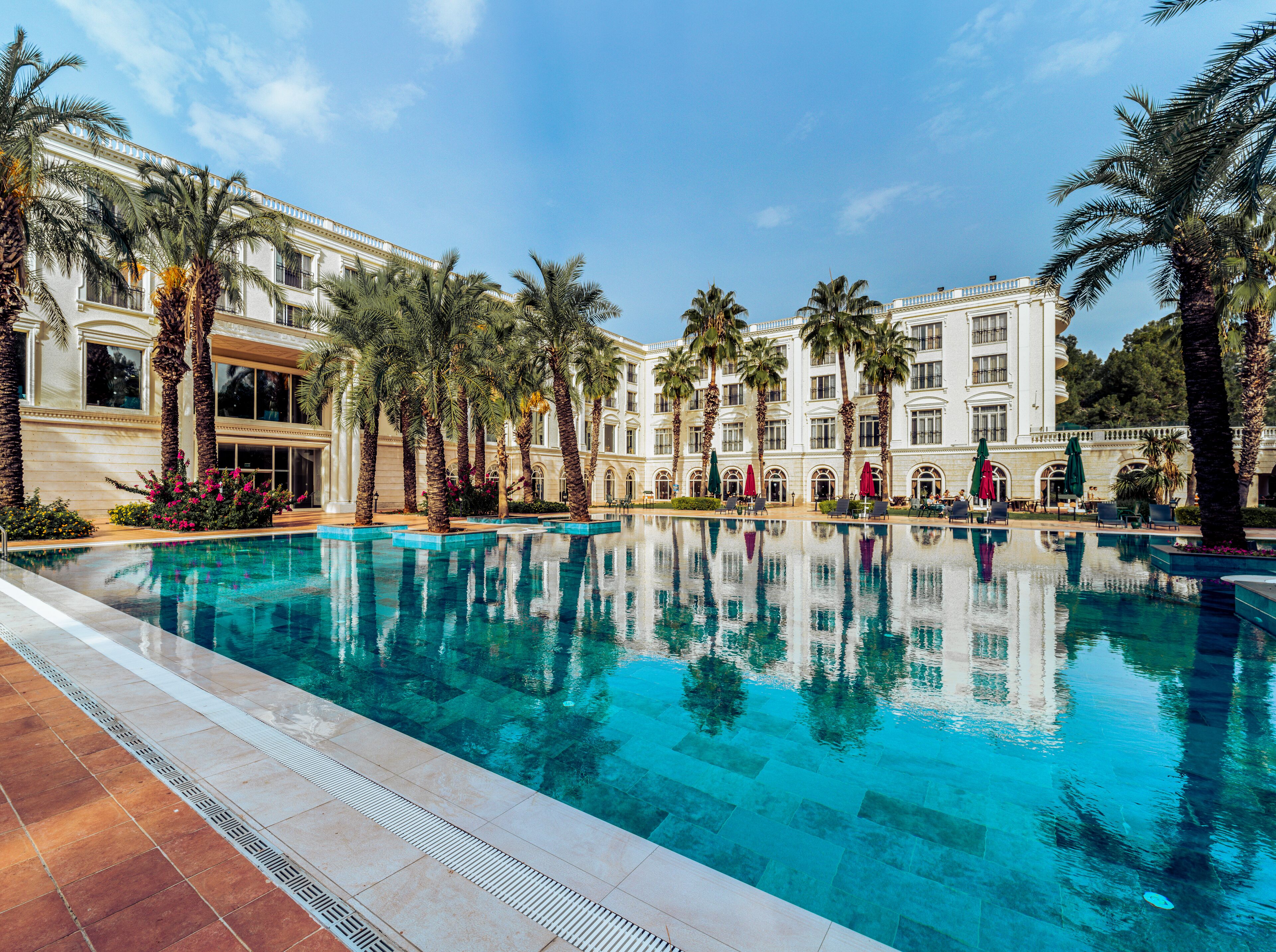 indoor pool, outdoor pool, pool umbrellas, pool loungers