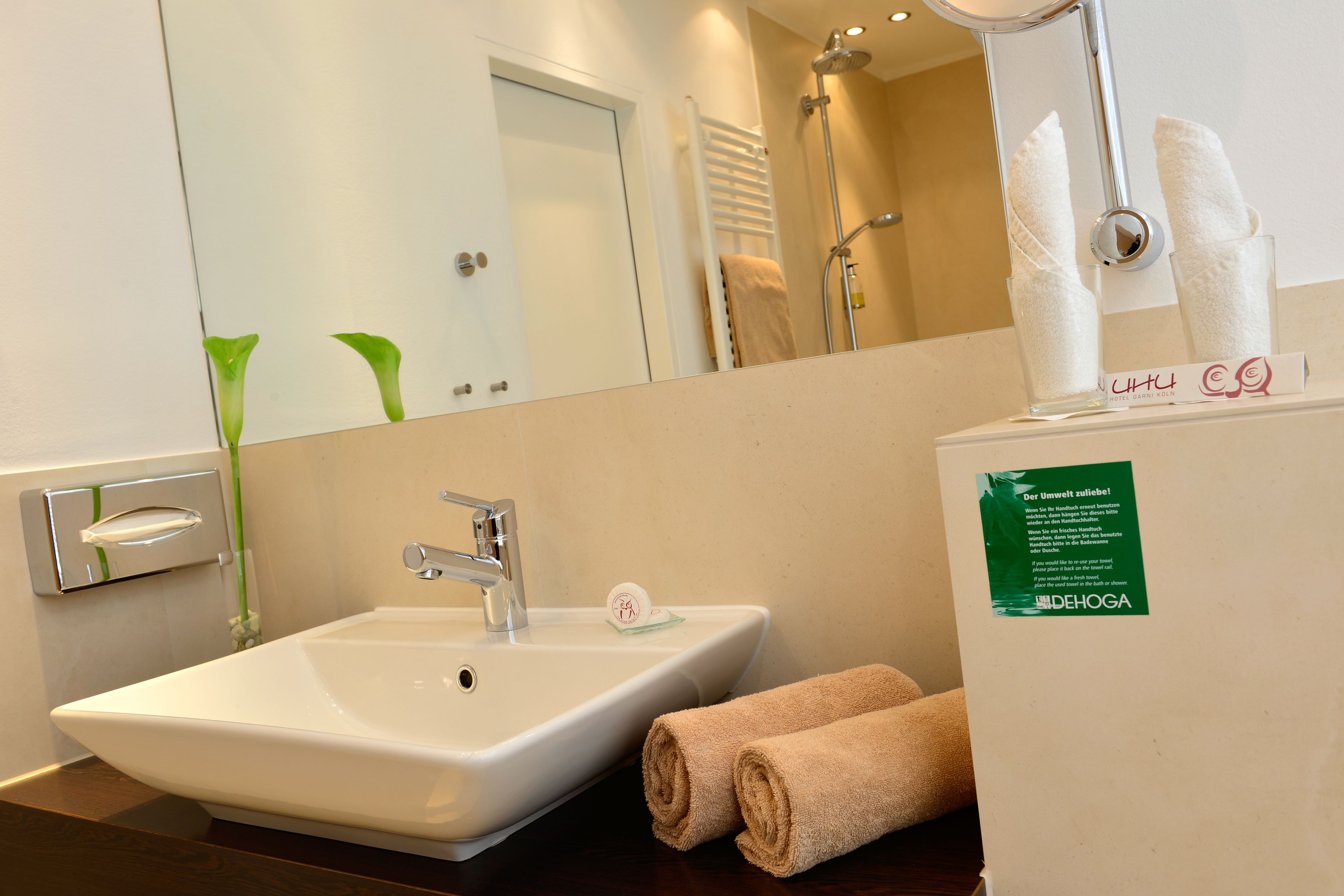 classic studio suite | bathroom | slippers, towels