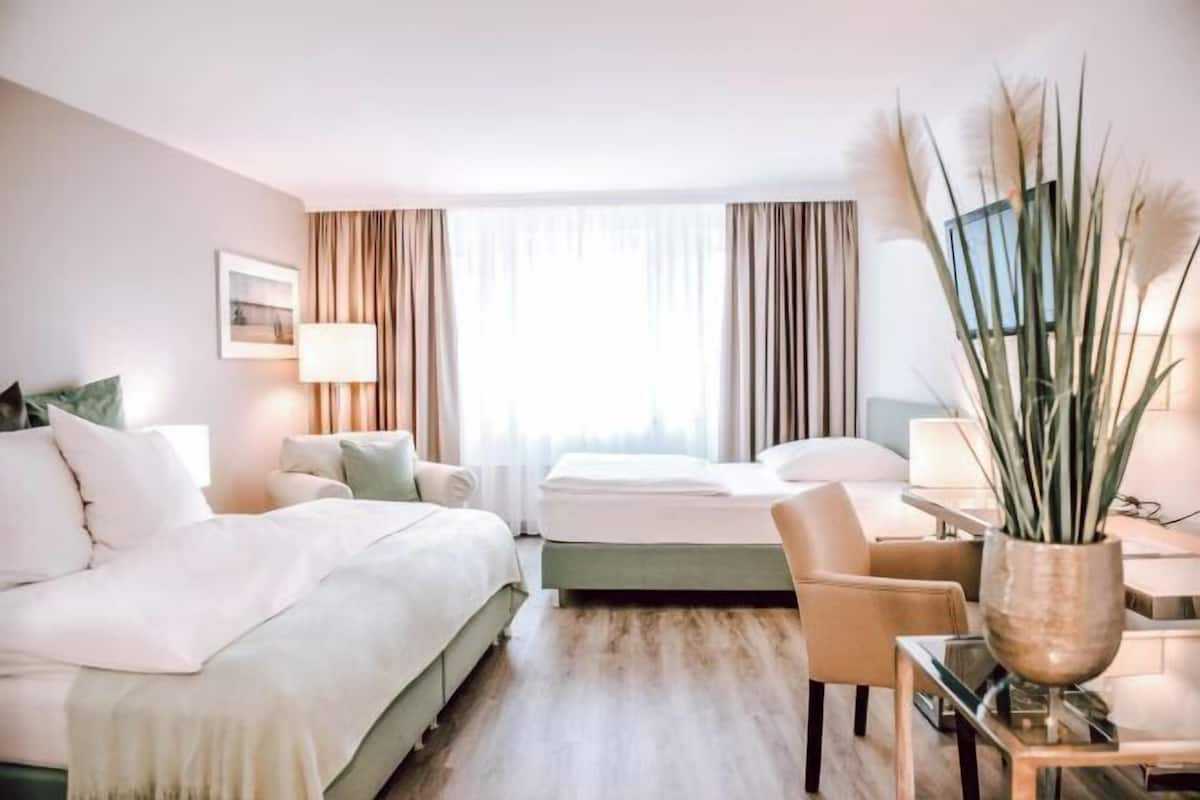 Premium bedding, desk, blackout drapes, soundproofing