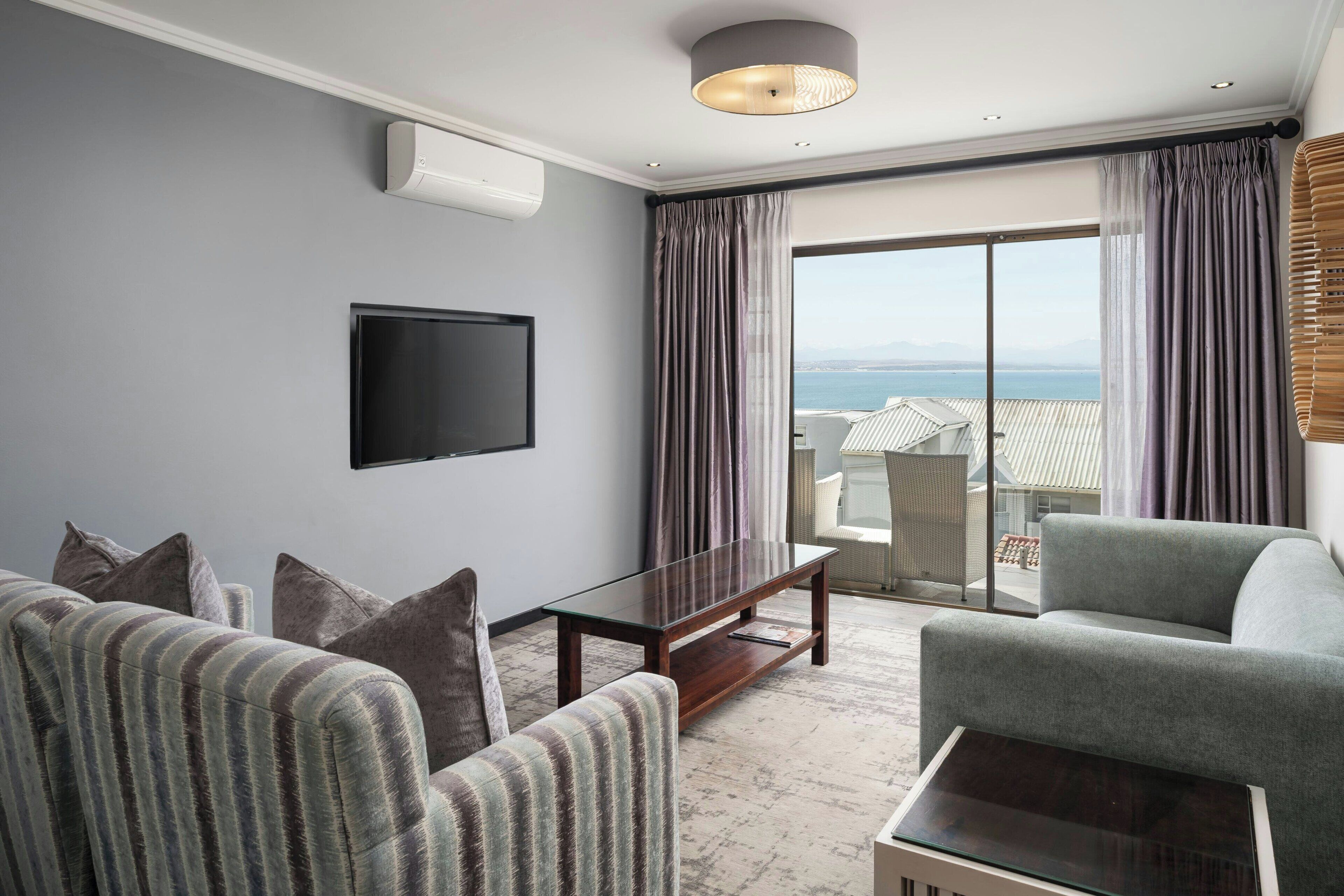 Suite, 1 Bedroom, Balcony, Harbor View | Down comforters, in-room safe, individually decorated