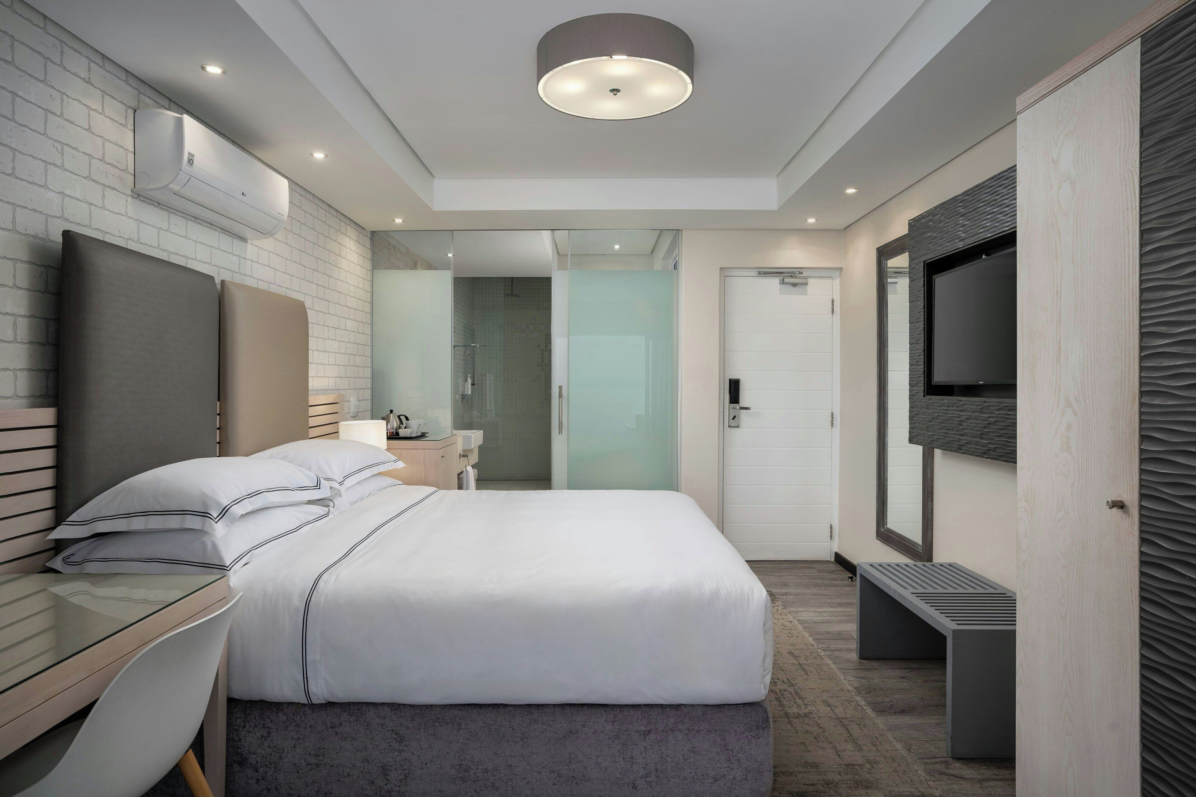 Room, 1 King Bed, Balcony, Harbor View | Down comforters, in-room safe, individually decorated